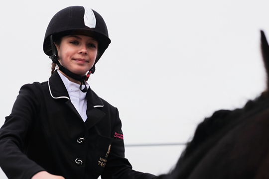 horse rider smiling