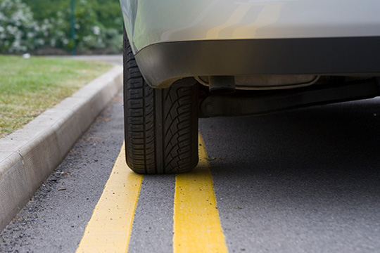 parked car on double yellow lines