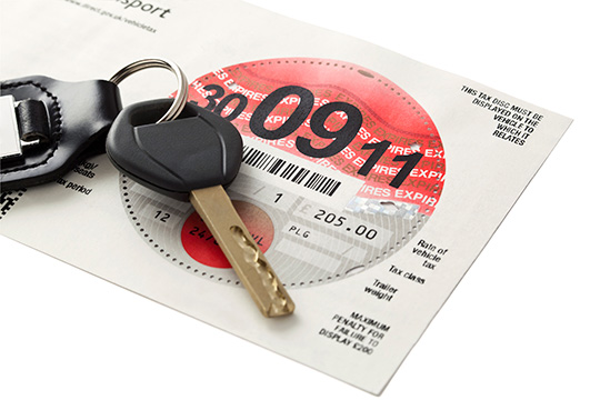 vehicle tax disc with car keys