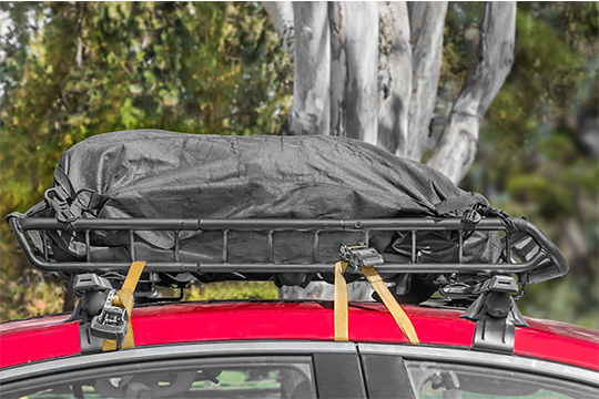 heavy load on the red car roof rack