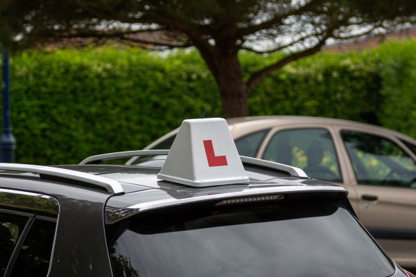 Learner driver sign of the roof of a car